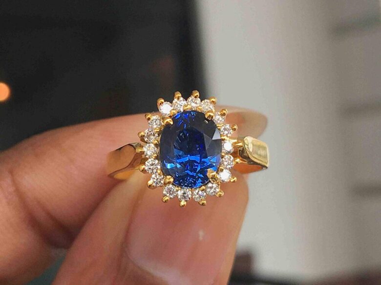 blue and gold engagement ring